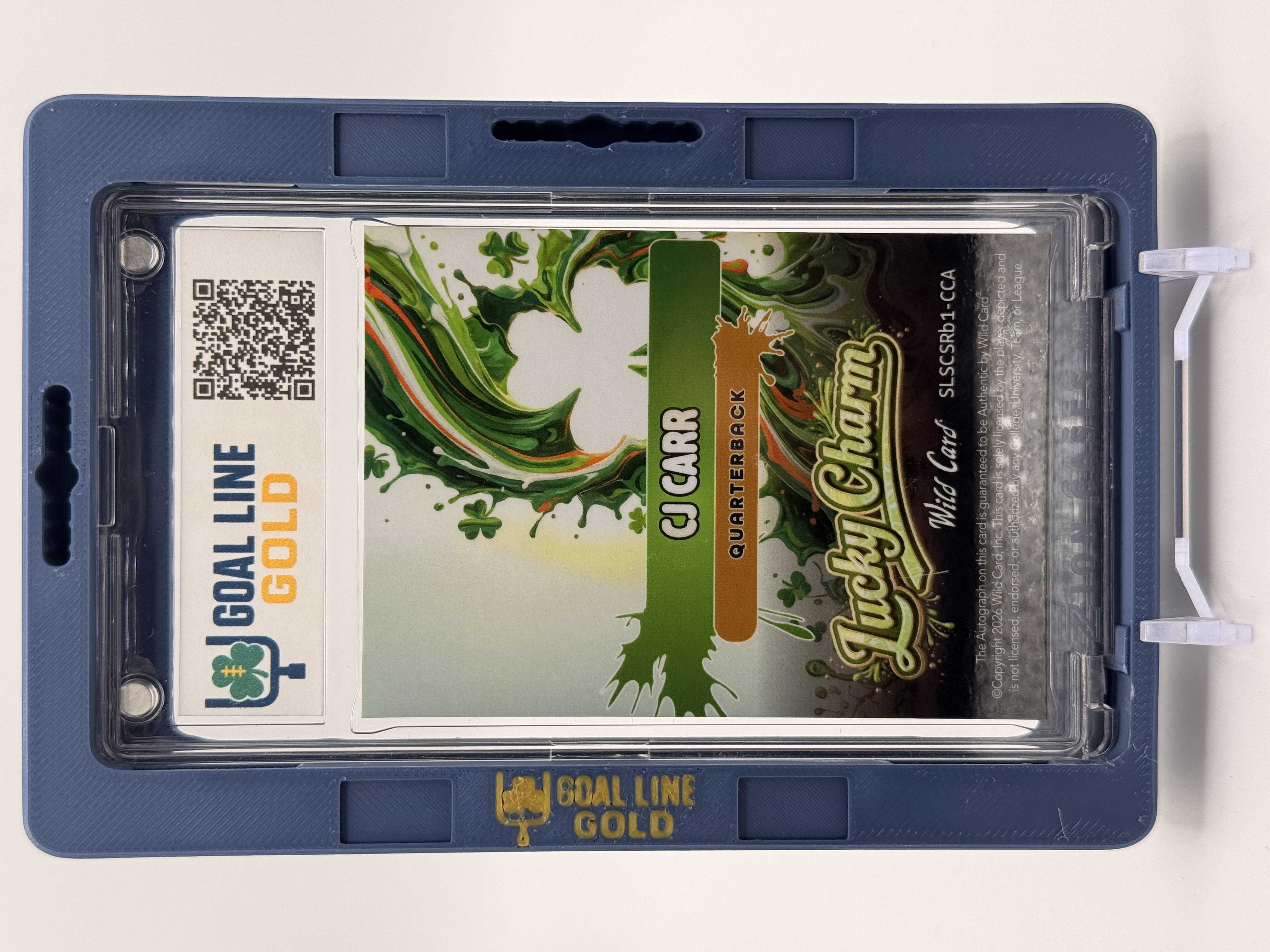 Back of the navy Goal Line Gold flagship frame showing branded backplate, QR code, and embossed GOAL LINE GOLD wordmark